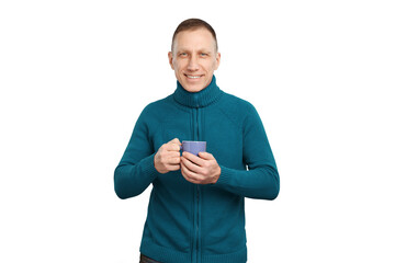 Smiling average age man in blue sweater isolated on white background holding a blue cup of coffee