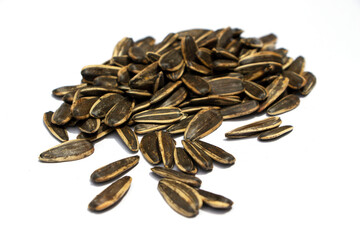 group of sunflower seeds isolated on white background