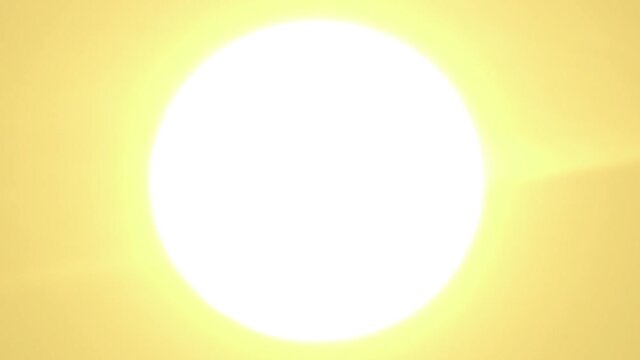 a slow zoom in of the sun