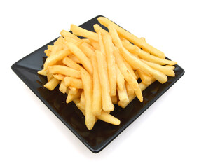 a pile of french fries isolated in black plate on white