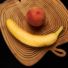 bananas, peaches are on the table