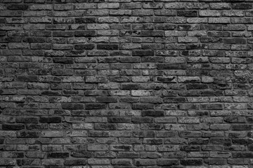 Black brick wall. Loft interior design. Architectural background.