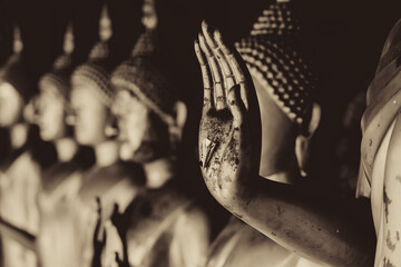 Closeup beautiful Buddha hand statue  beautiful culture of Asian calm and peaceful in Thailand mono...
