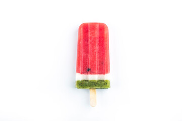 frozen fresh fruit watermelon and kiwi popsicles sitting on white background