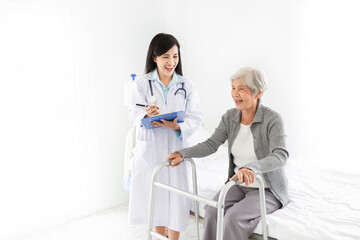 walk training and rehabilitation process, old asian stroke patient learning to use walker with female asian doctor, elderly healthcare promotion, doctor order and explain, happiness hospital