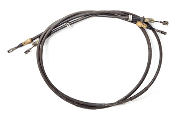 Pair of handbrake cables from a car or motorcycle on a white isolated background during repair and replacement in a vehicle service workshop. Spare parts catalog.