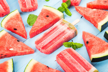 Homemade watermelon popsicles on a plate. Summer food concept.