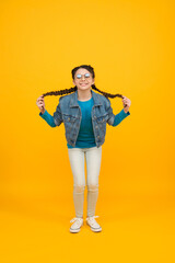 happy girl jumping high. little schoolgirl in glasses. full of energy. feel freedom. happy children day. carefree teen kid. finally graduated. carefree playing child. pure happiness