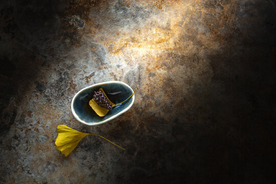 Pine cone in a tiny bowl