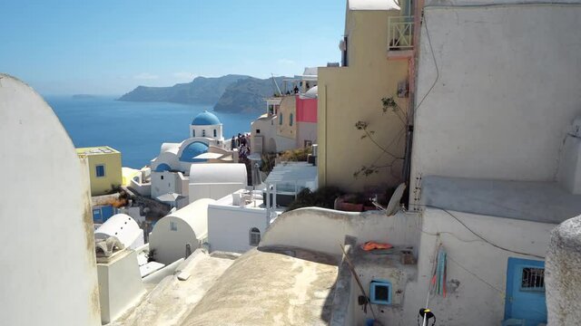 Oia town on Santorini island, Greece. Caldera on Aegean sea.