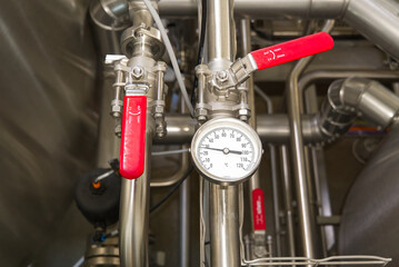 Red butterfly gate valve to prevent reverse flow of water in factory and industrial production...