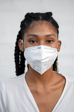Portrait of young woman wearing face mask