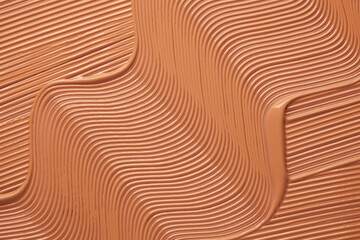 Texture of smudge cosmetic cream foundation liquid background