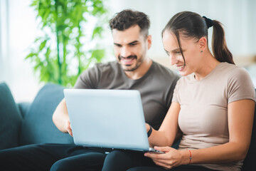 online creative home work space concept, couple work from home with laptop