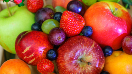 Close-up view of large collection fresh fruits useful for health. Harvesting concept. Fresh background.