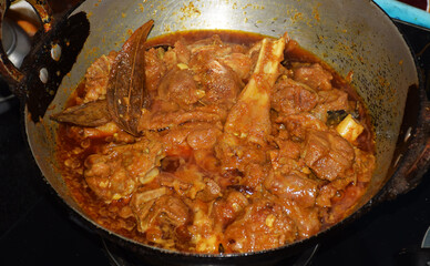 Indian Bengali Mutton Curry in round pan called as Karhai in Hindi language