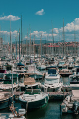 Fototapeta na wymiar Panoramic view of boats moored in the Old Port of Marseille. It has been the natural harbor of the city since antiquity and is now the main popular place in Marseille. 