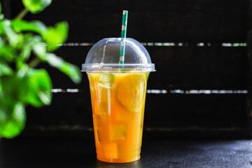 orange juice drink or lemonade citrus mandarin mint transparent beverage glass cup takeaway drink Menu concept serving size food background top view copy space organic healthy eating