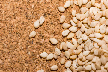 sesame seeds on wooden background, organic sesame seeds