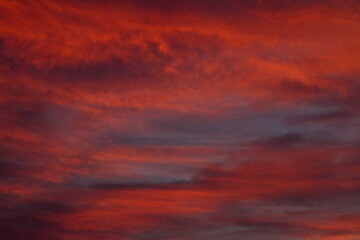 Colorful cloud patterns with golden hour light.