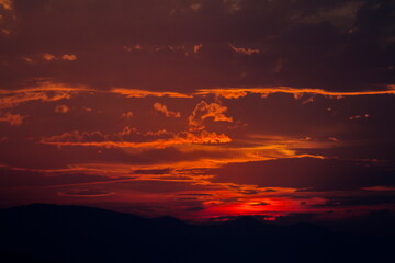 Colorful cloud patterns with golden hour light.