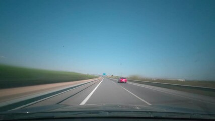 Time lapse driving at motorway during a summer day