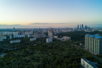 panoramic views of the city infrastructure in the evening filmed from a drone