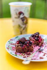 Fruit cake on the yellow table
