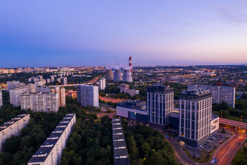 Obraz premium panoramic views of the city infrastructure in the evening filmed from a drone