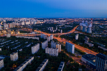 Fototapeta na wymiar panoramic views of the city infrastructure in the evening filmed from a drone