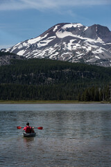 Mountain lake summer kayaking on Sparks Lake, Bend Oregon, Pacific Northwest