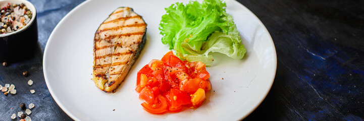 fried salmon grilled with vegetables salad tomato food background top view copy space for text organic eating healthy keto or paleo diet pescetarian