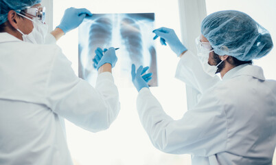 close up. medical colleagues discussing an x-ray of the lungs .