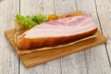 Smoked pork breast with salad leaves