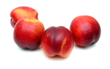sweet peaches on a white background 