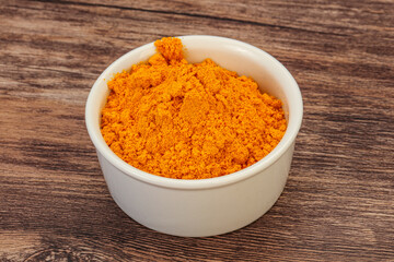 Tumeric powder in the bowl