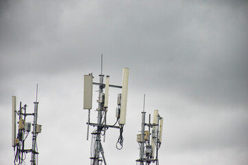 Three pillars of WIFI signal in the midst of bad weather.