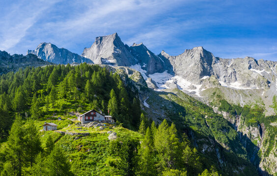 Sasc Fura hut with the famous Pizzo Badile in the background, Bondasca valley, Bregaglia valley, Graubunden