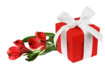 Red gift box with ribbon bow and alstroemeria flowers