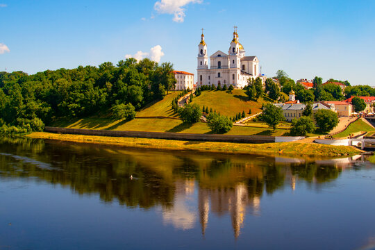 Vitebsk,Belarus - 18 July 2020 : Holy Assumption Cathedral of the Assumption on the hill and the Holy Spirit convent and Western Dvina River. Vitebsk, Belarus