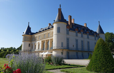 Fototapeta na wymiar View of Rambouillet castle , XIV century, in picturesque Public Park in town of Rambouillet , 50 km southwest of Paris. France.