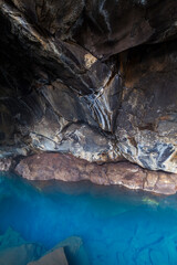 Grjótagjá, small lava cave near lake Mývatn with a thermal spring inside. Myvatn, North Iceland, Iceland, Europe