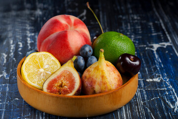fruits in wooden cup