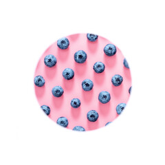 Fresh berries blueberry on pink background. Colorful fruit pattern of blueberries as background. Creative berries concept. Flat lay, top view, copy space