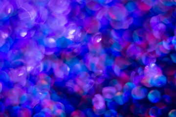 Rainbow blue glitter festive background with bokeh lights. Celebration concept for Holidays and anniversary.