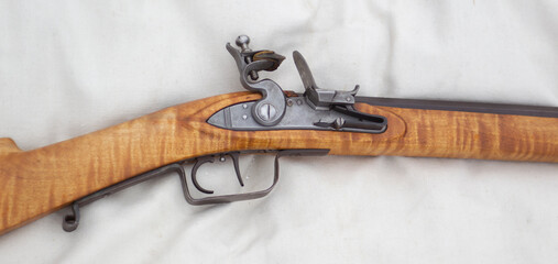 Early flintlock and percussion firearms