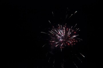 Festive fireworks against the black sky