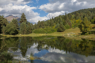 Fototapeta na wymiar Reflections in the water of the Caucasus Mountains, Georgia