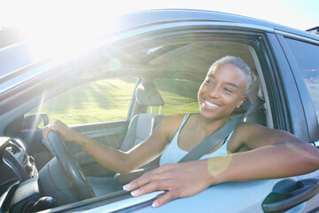 Black woman driving car