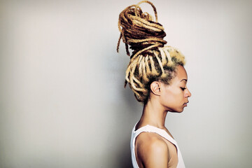 Black woman with dreadlocks bun